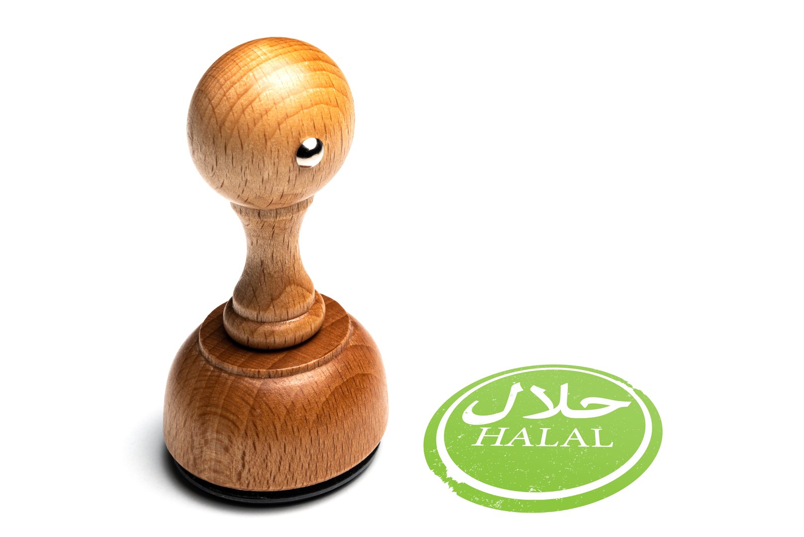 wooden HALAL rubber stamp and imprint with word halal in arabic isolated on white background