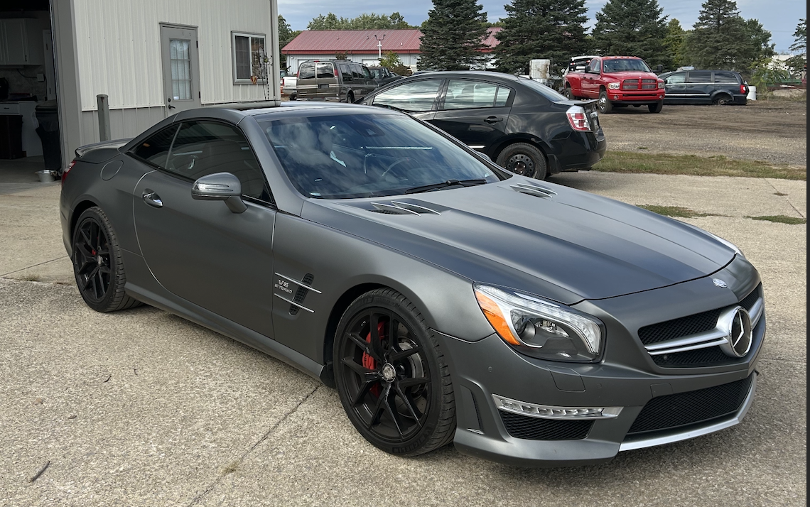 Before and after comparison showing deep cleaned car seat by Maxx's Mobile Detailing