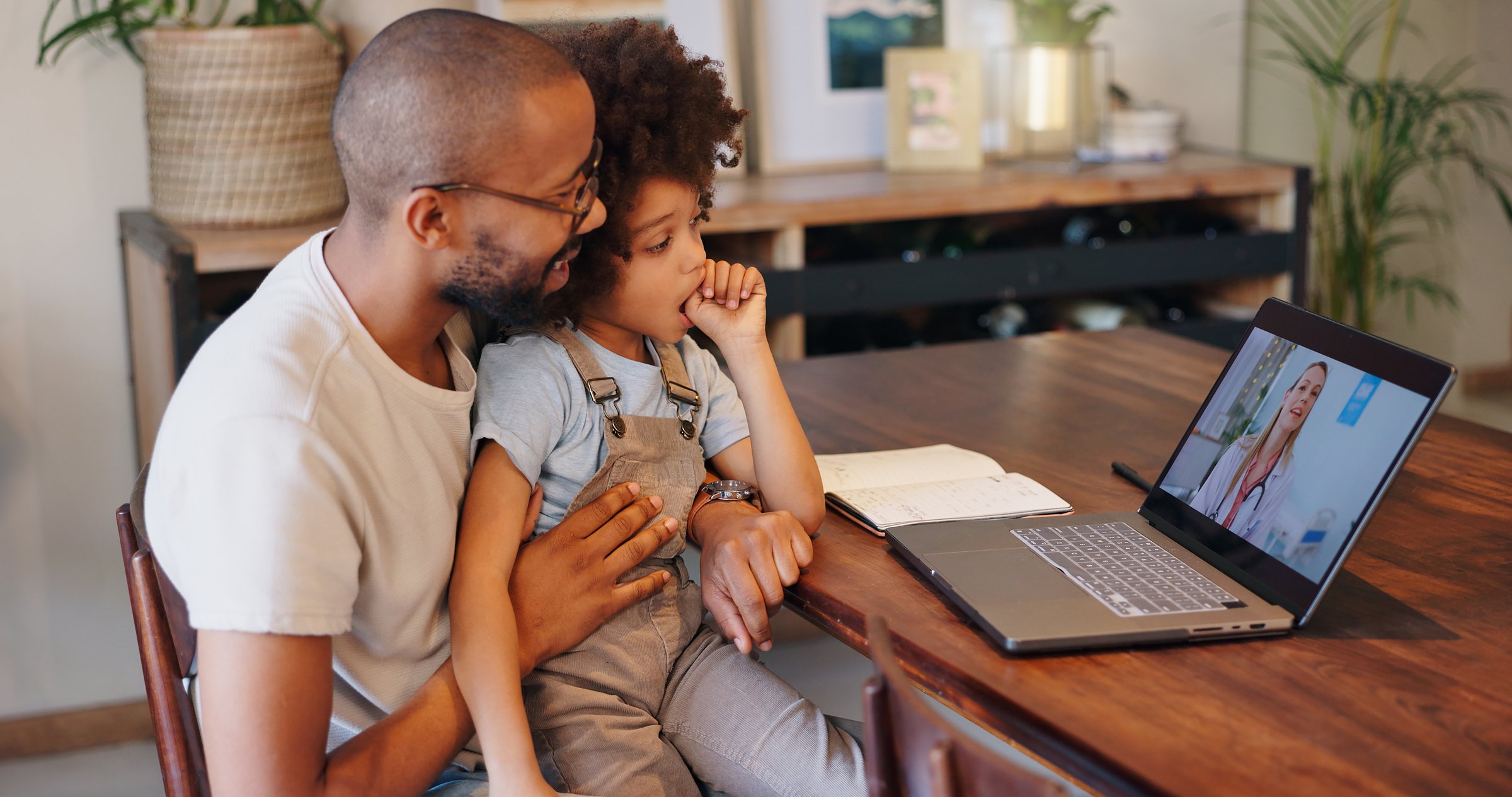 Child, black man and laptop screen with doctor for telehealth service, communication and advice. Home, boy and father with pediatrician on tech for medical support, discussion or virtual consultation