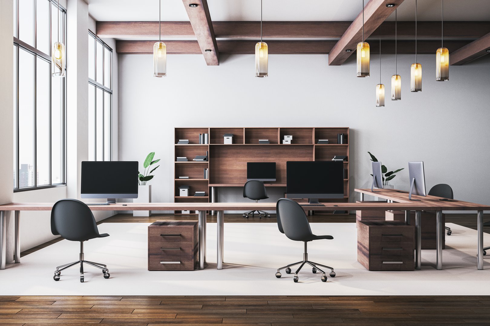 Contemporary office interior with wooden desks, chairs, and computers in a bright space. Large windows, pendant lights, and shelves add elegance. 3D Rendering.