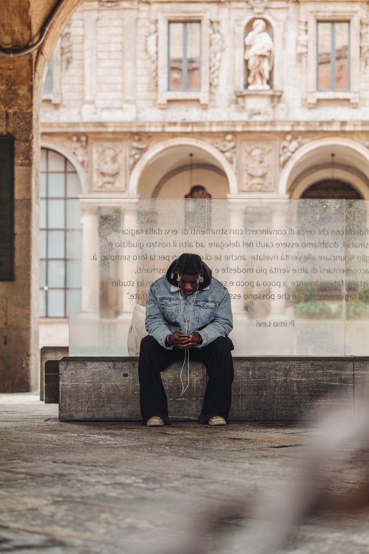 Man sitting and listening to music