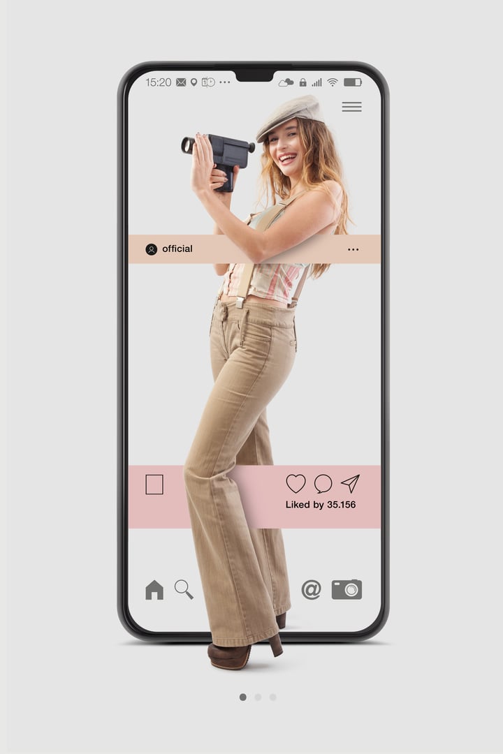 Social media manager, smiling Influencer girl holding retro video camera, dressed in vintage style comes out from screen of mobile phone. Concept of content creator for social network.