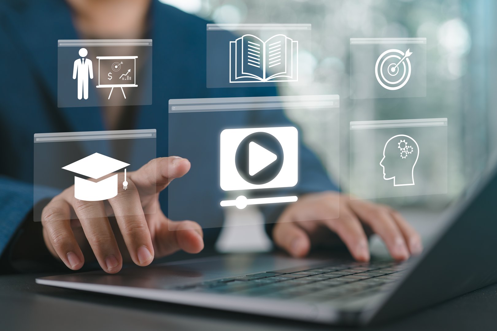 Concept of Online Education. Man use Online education training and e-learning webinar on the internet for personal development and professional qualifications. Digital courses to develop new skills.