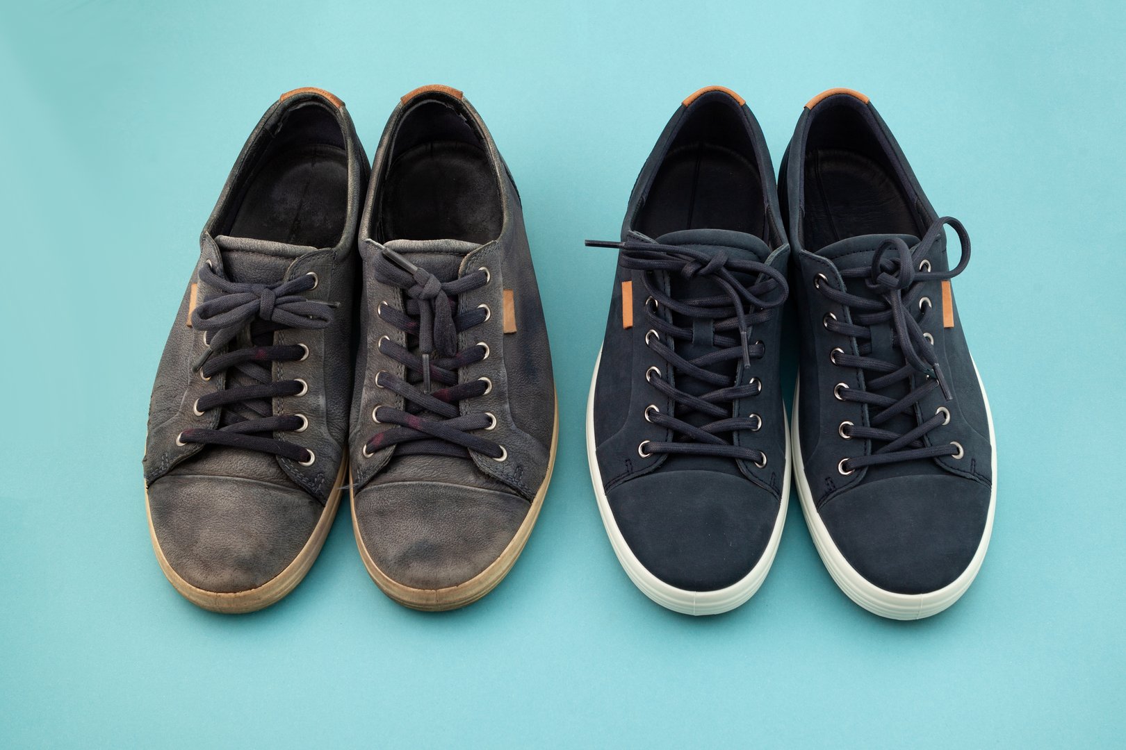 Contrast between two conditions of the same shoes. Shoe Repair Shop, Before and After concept. Removing Scuff Marks and Stains. Deep-Cleaning Sneakers. Used and new boots.