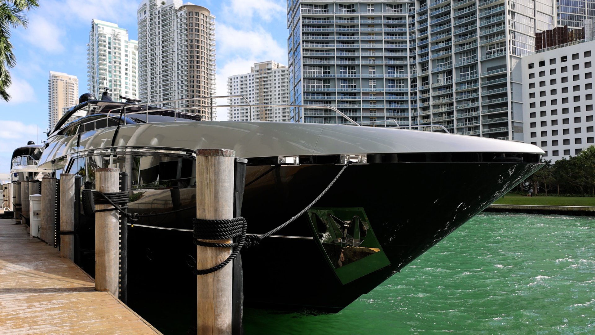 Miami, luxury condominiums and yachts located near city financial center and Biscayne Bay.
