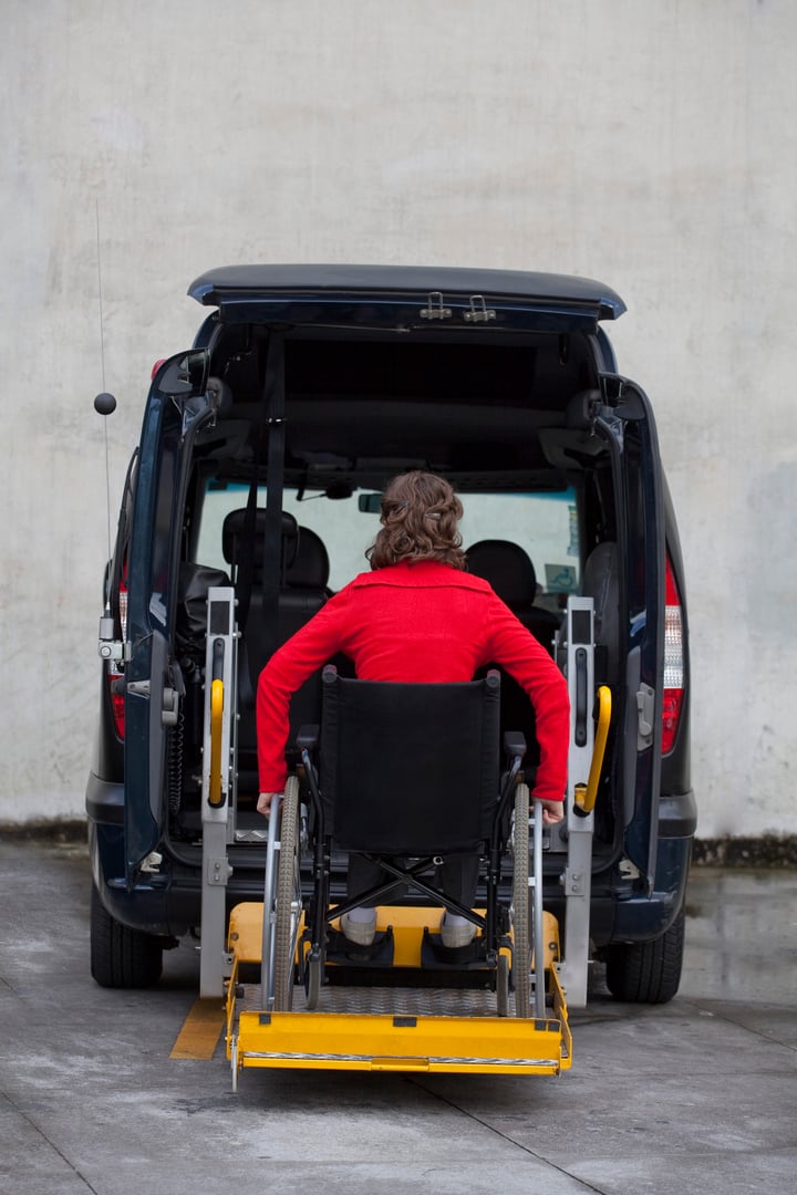 Woman using wheelchair lift