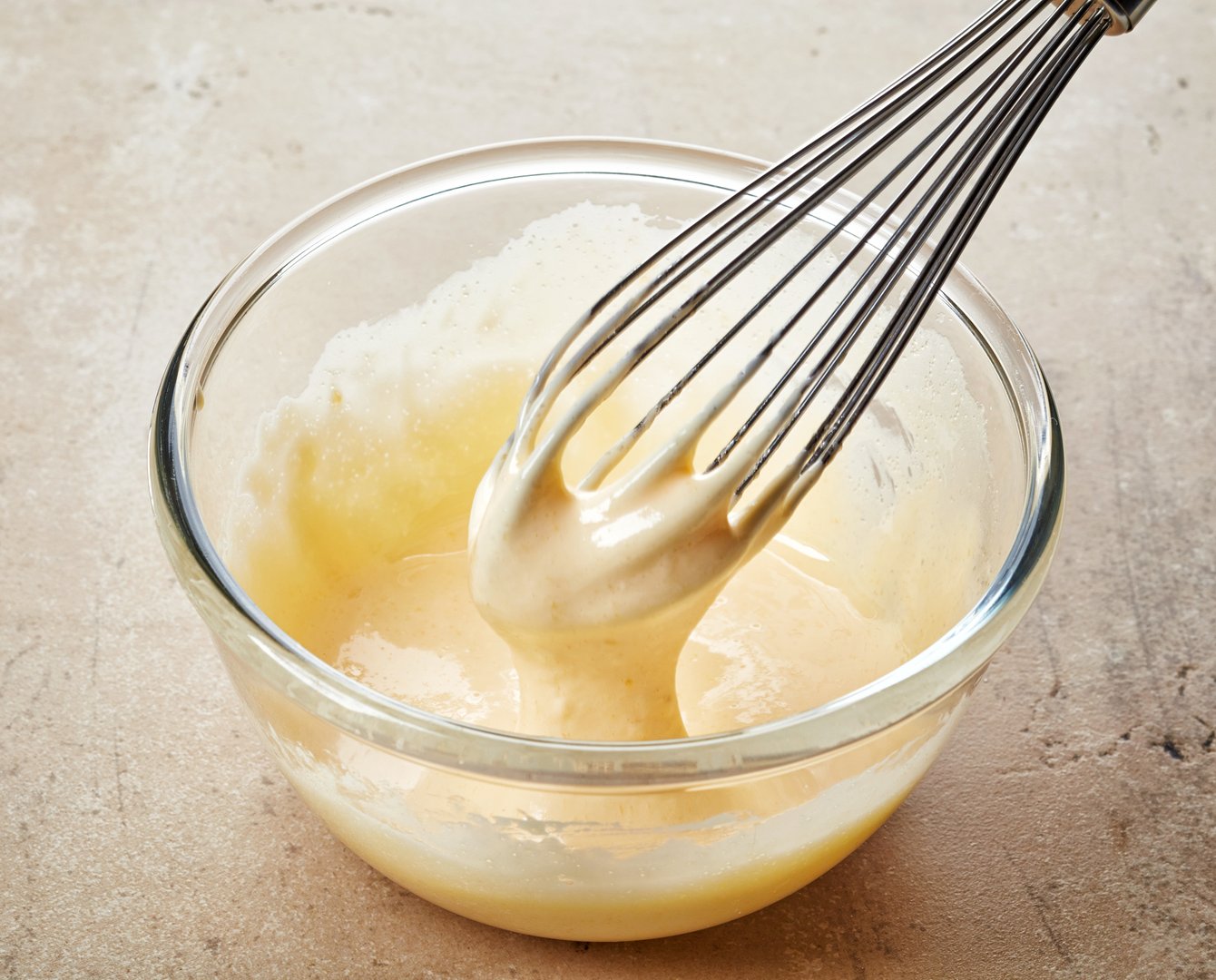Professional mixer preparing cream in a bakery kitchen