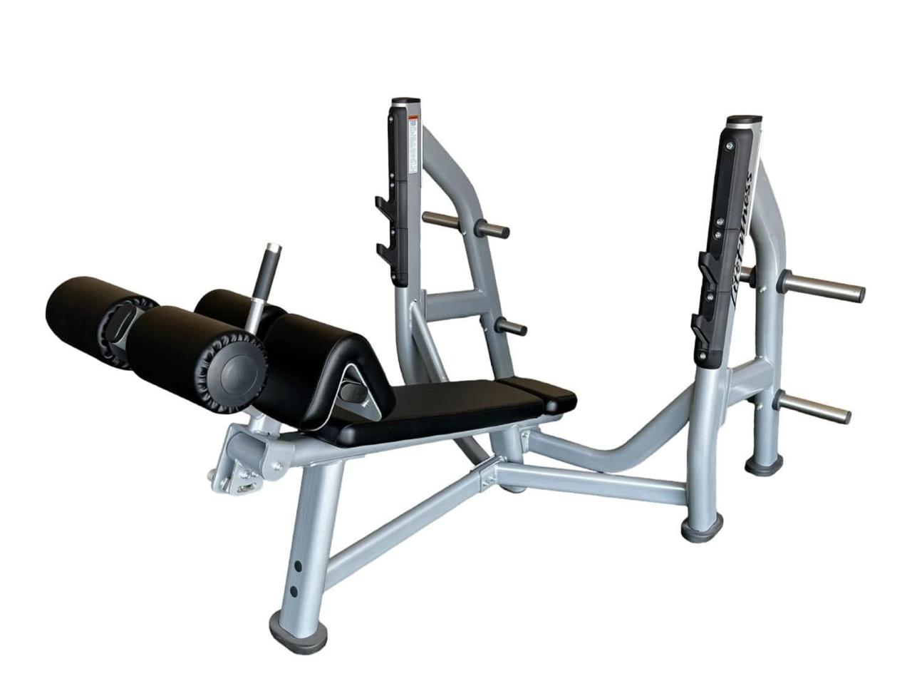 Incline leg press machine with padded rollers, weight holders, and adjustable settings on a sturdy metal frame.