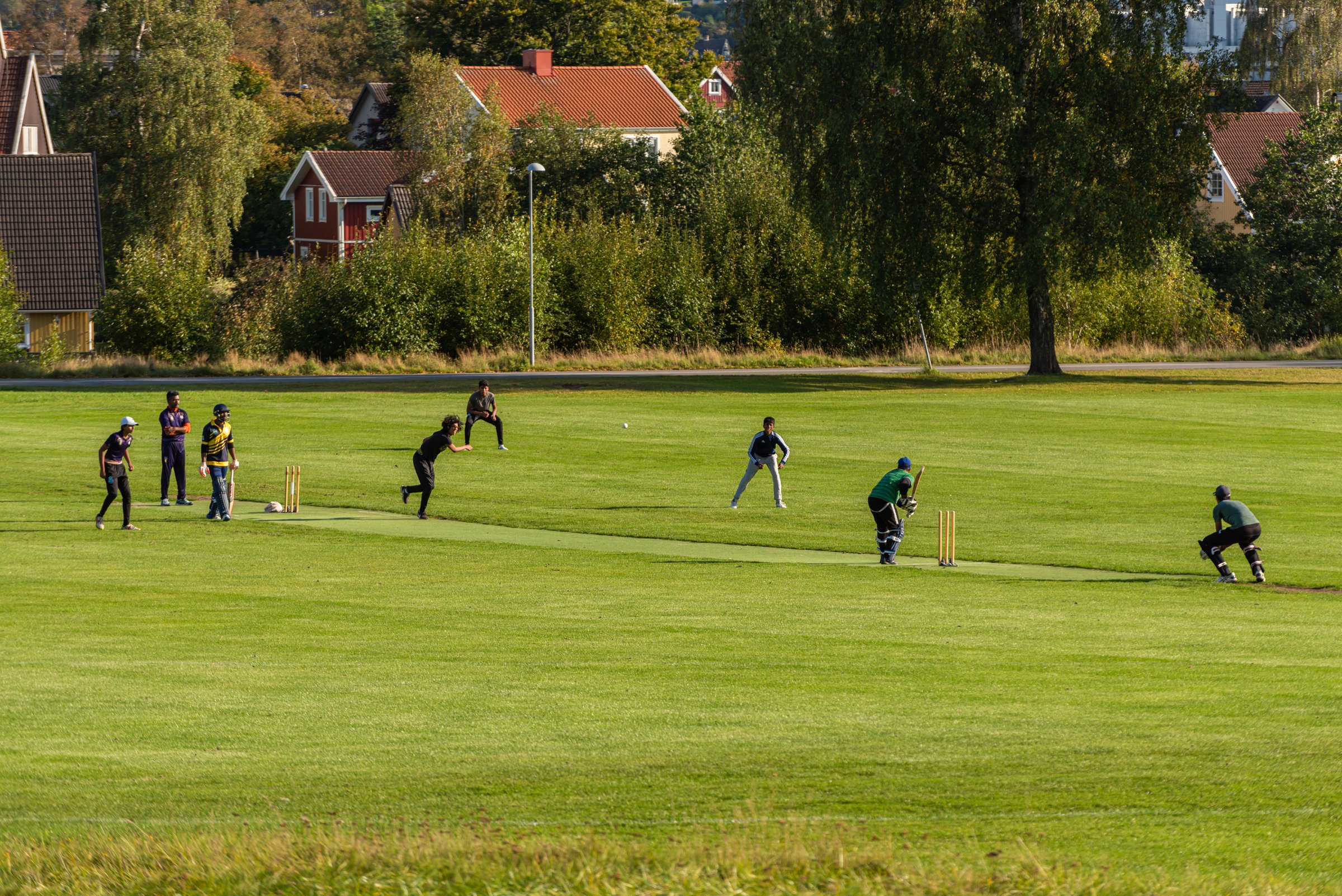 Gothenburg, Sweden - september 26 2021: Playing a game of cricket at Kviberg.