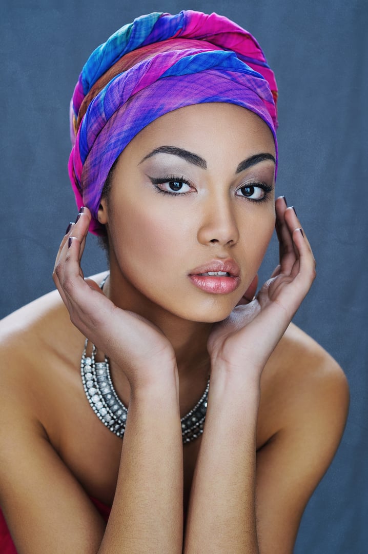 Young African beauty in ethnic headpiece