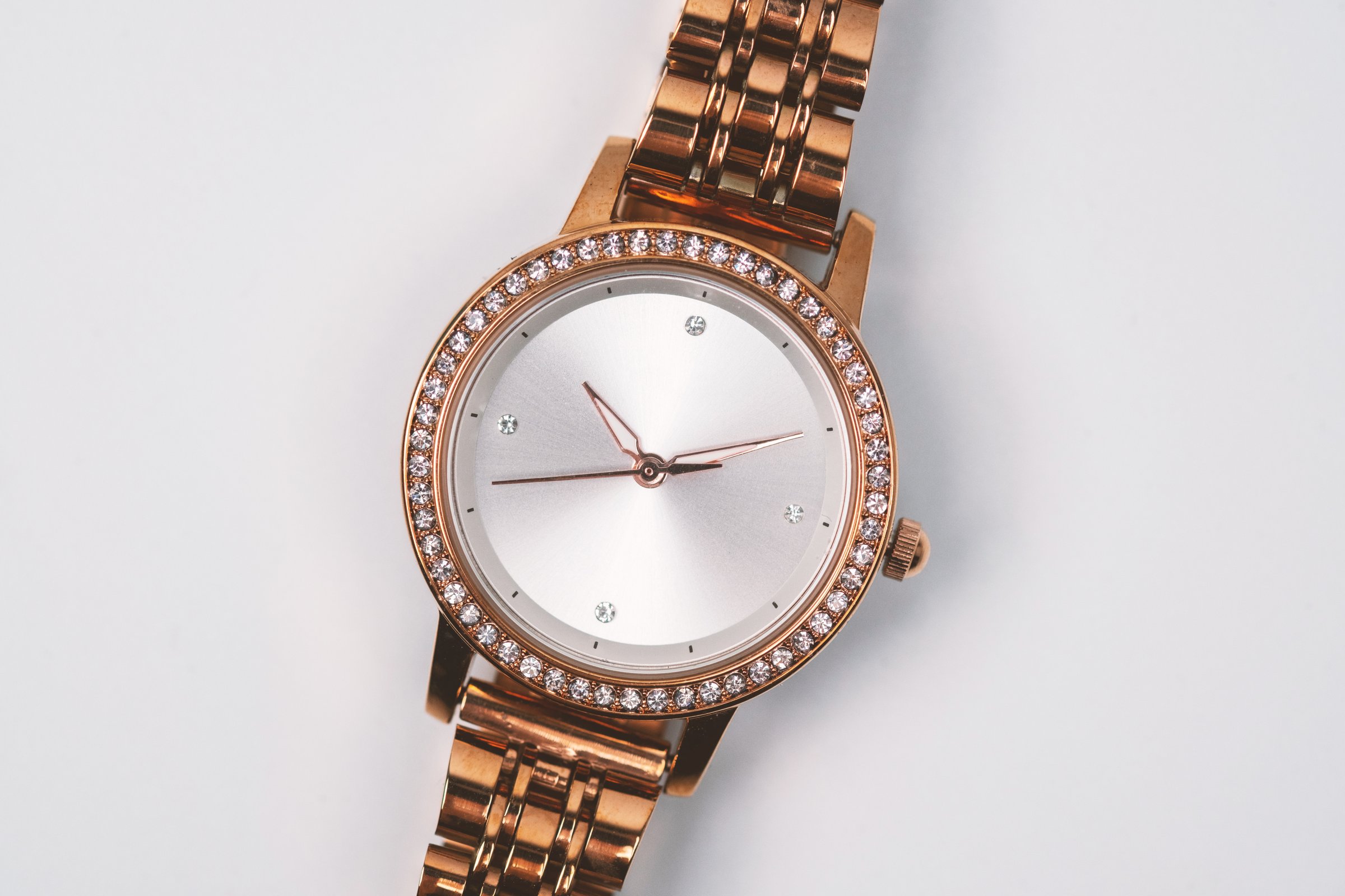 Elegant Rose Gold Wristwatch on a white background