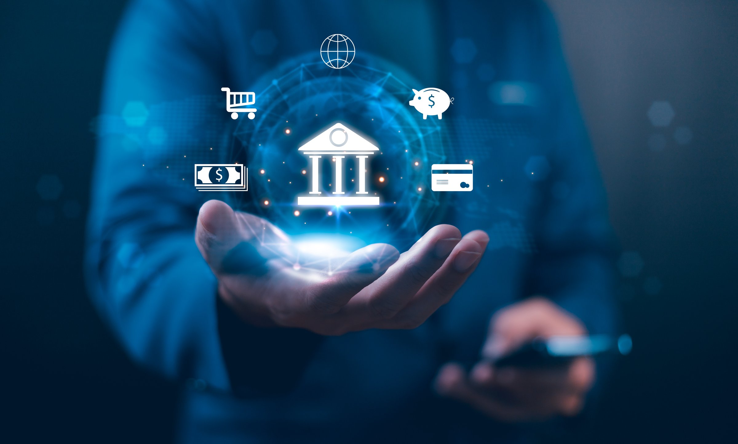 Businessman using smartphone with digital technology for online banking