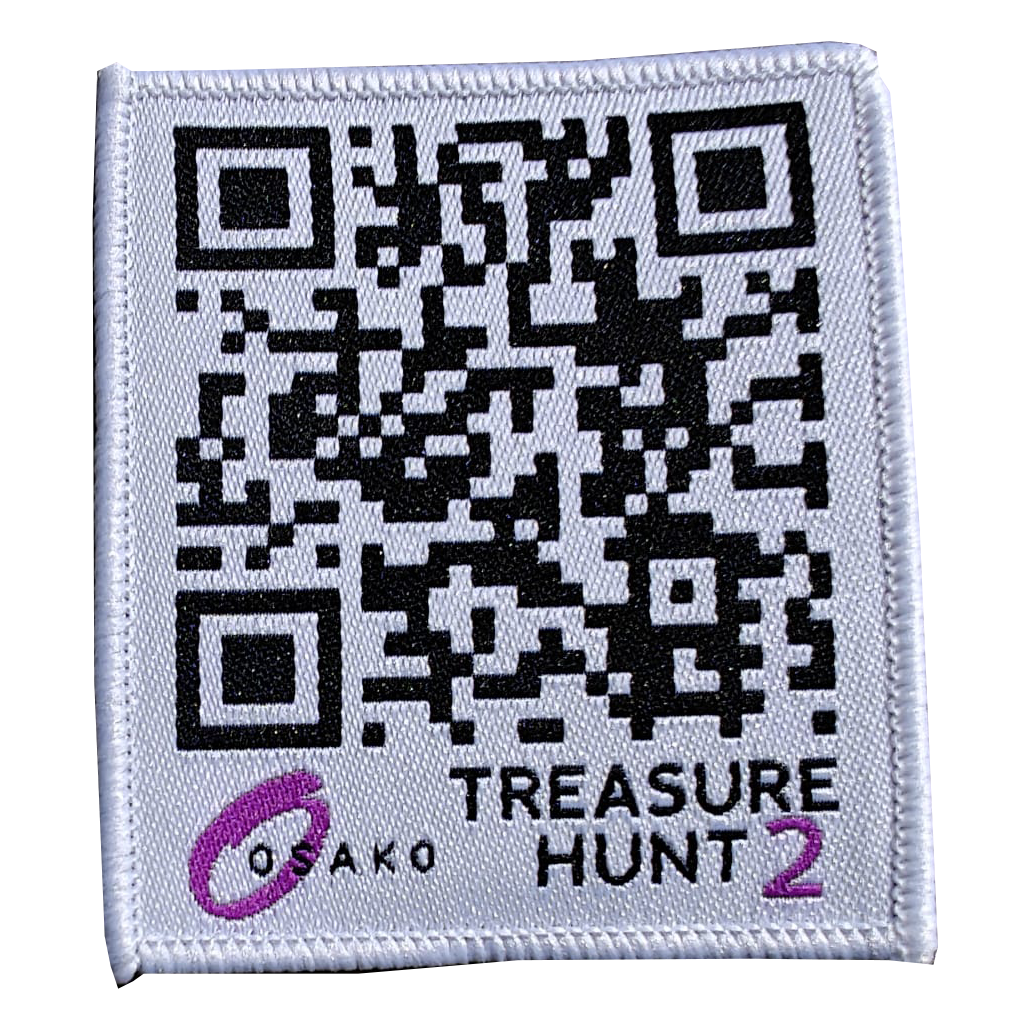 A fabric patch with a QR code labeled OSAKO TREASURE HUNT 2 in black and purple text.