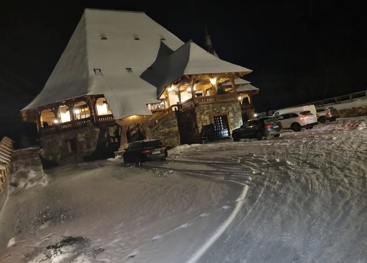 Teenage friends playing a word-guessing game at the dinner party.