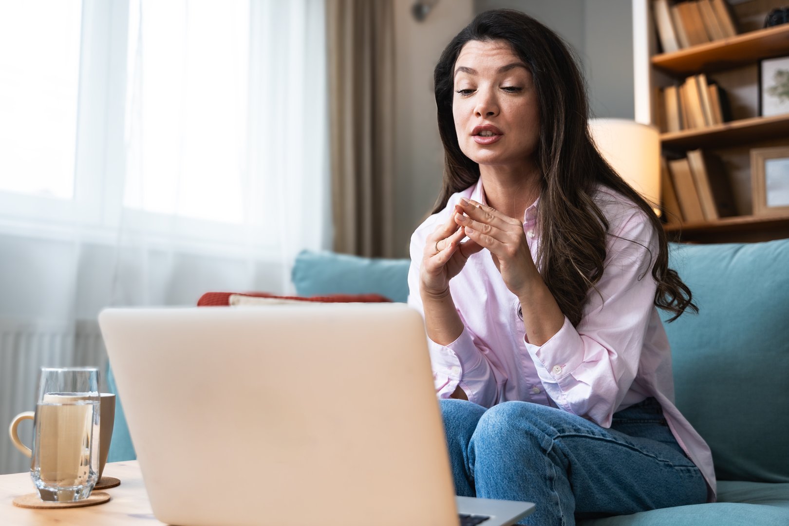 Telemedicine. Young woman doctor working at home office, private general practitioner, healthcare and medical female worker using laptop computer for contact with senior patients Helping people online