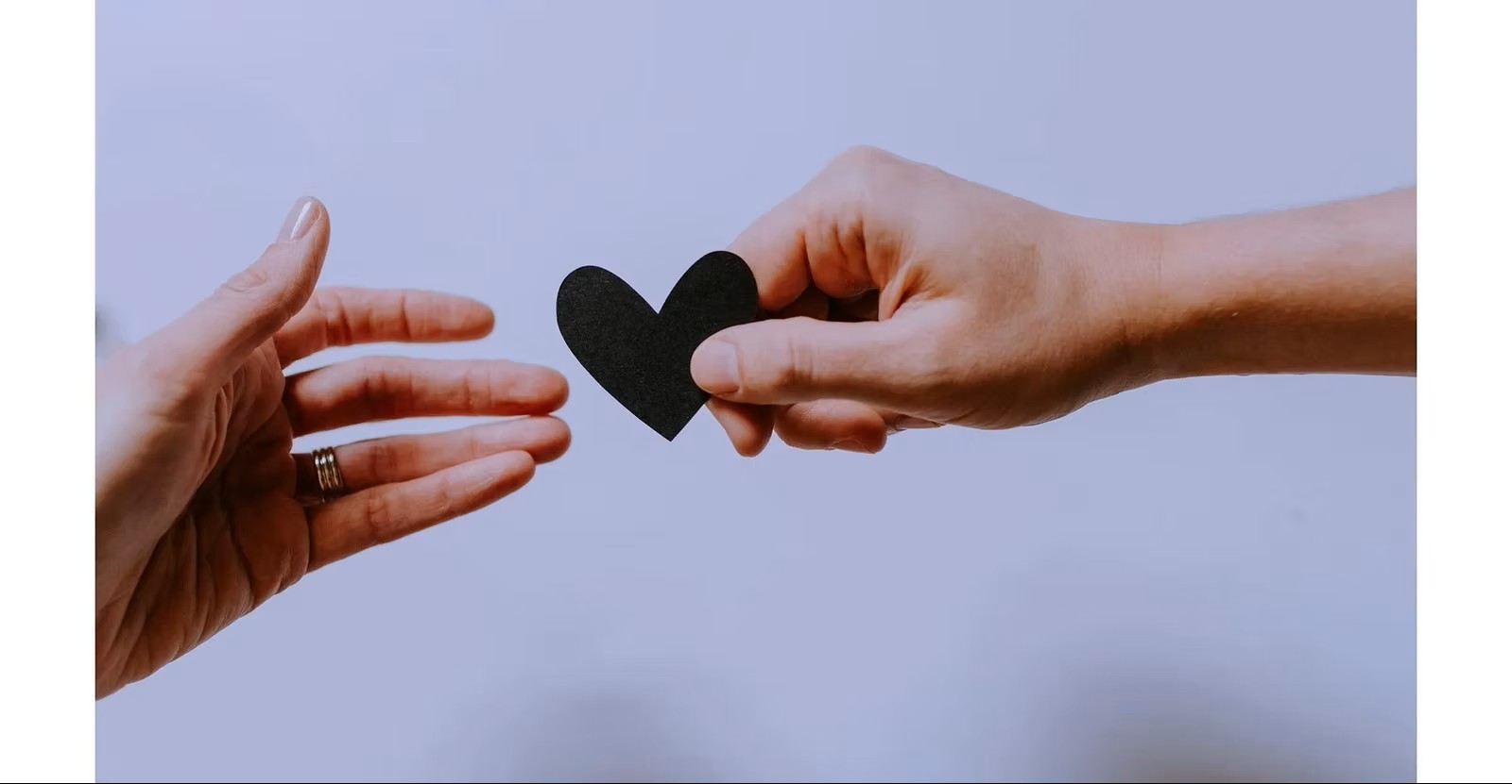 Hands holding in support and connection