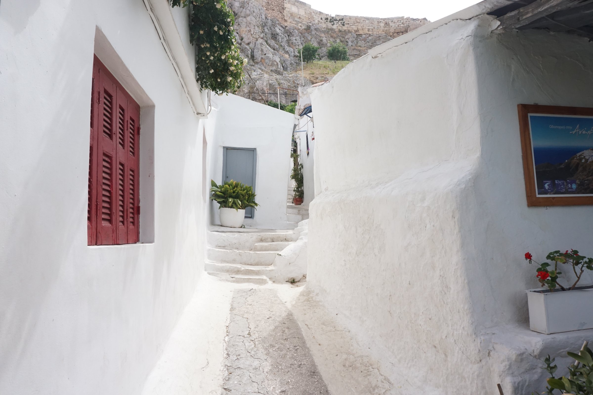 A white-washed pathway in a residential neighborhood in  Athens, Greece