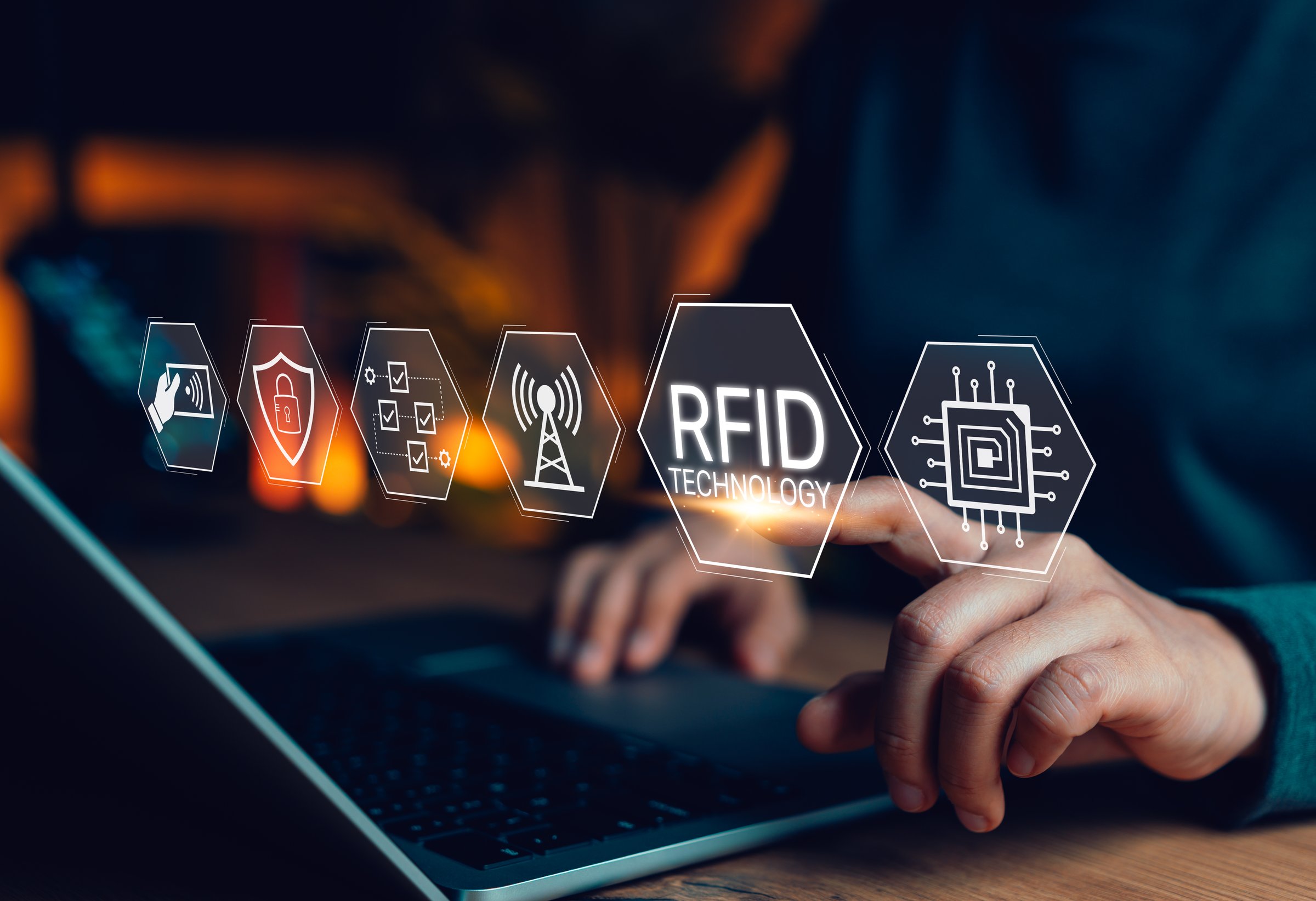 RFID Technology and Radio Frequency Identification Concept. Person using laptop with RFID icons, wireless signal, security shield, checklist, data flow, representing RFID tech, smart tracking systems,