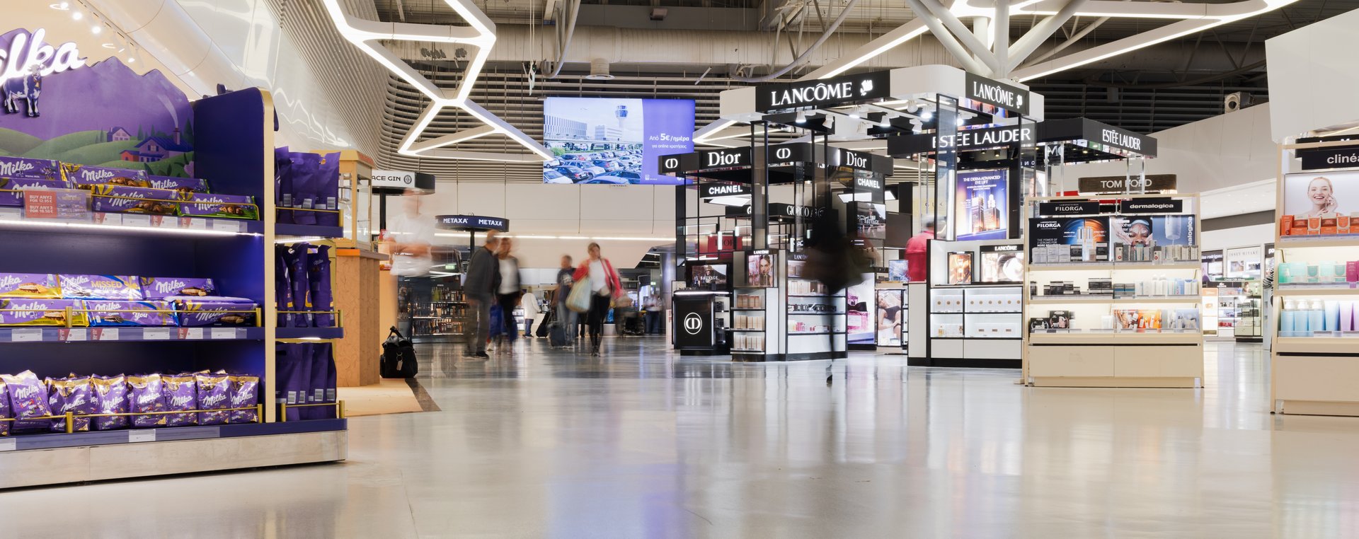 Duty-Free Shopping Area with Cosmetics and Chocolate Displays in a Modern Airport Terminal. 04 October 2025