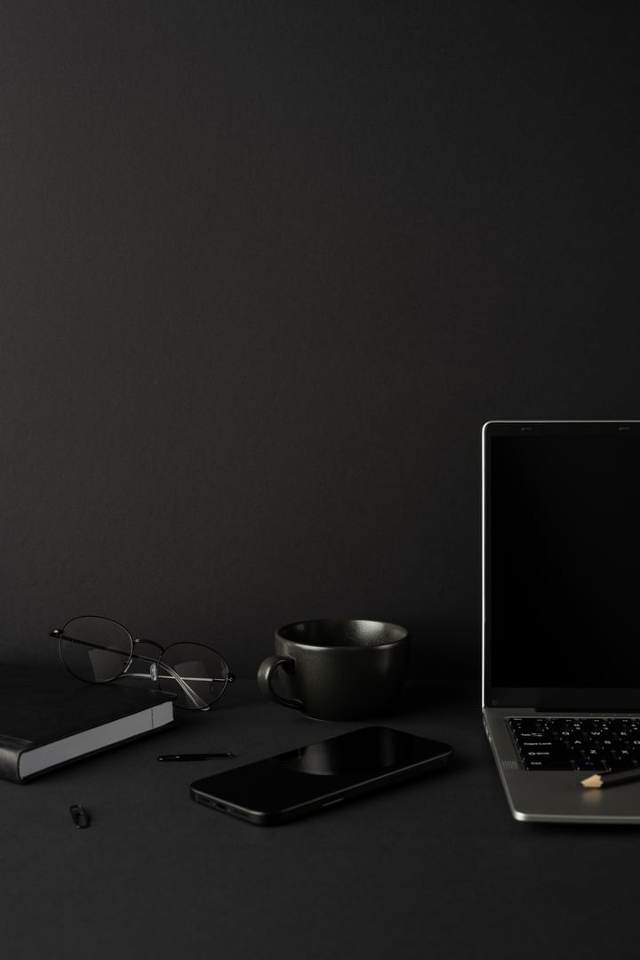 Premium workspace with laptop and smartphone