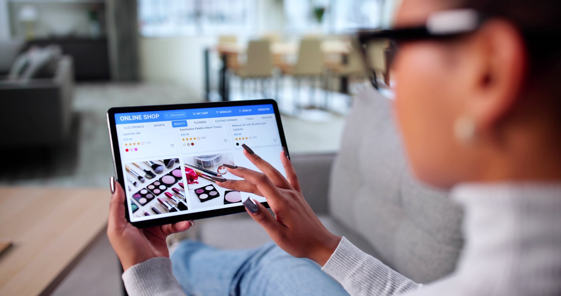 Young Black Woman Purchases Cosmetic Products Through Ecommerce Website On Tablet.