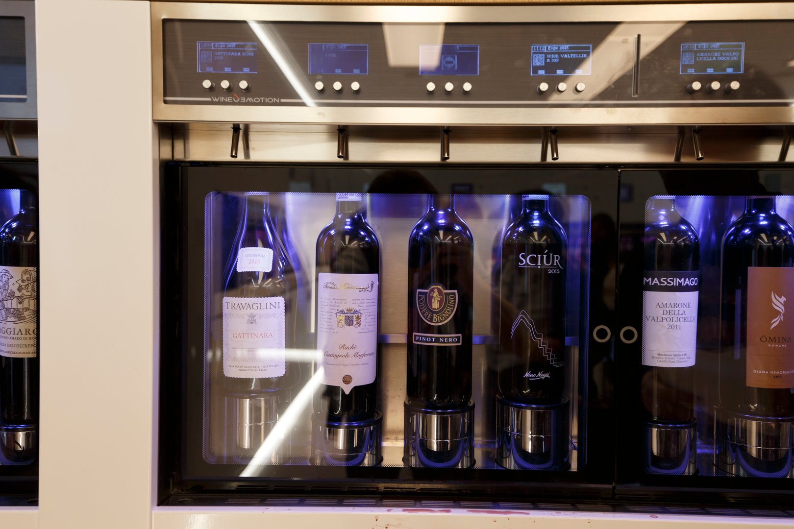 Milan, Italy, 13 September 2015: italian wine displayed in modern interior windows design at EXPO 2015, in Milan.