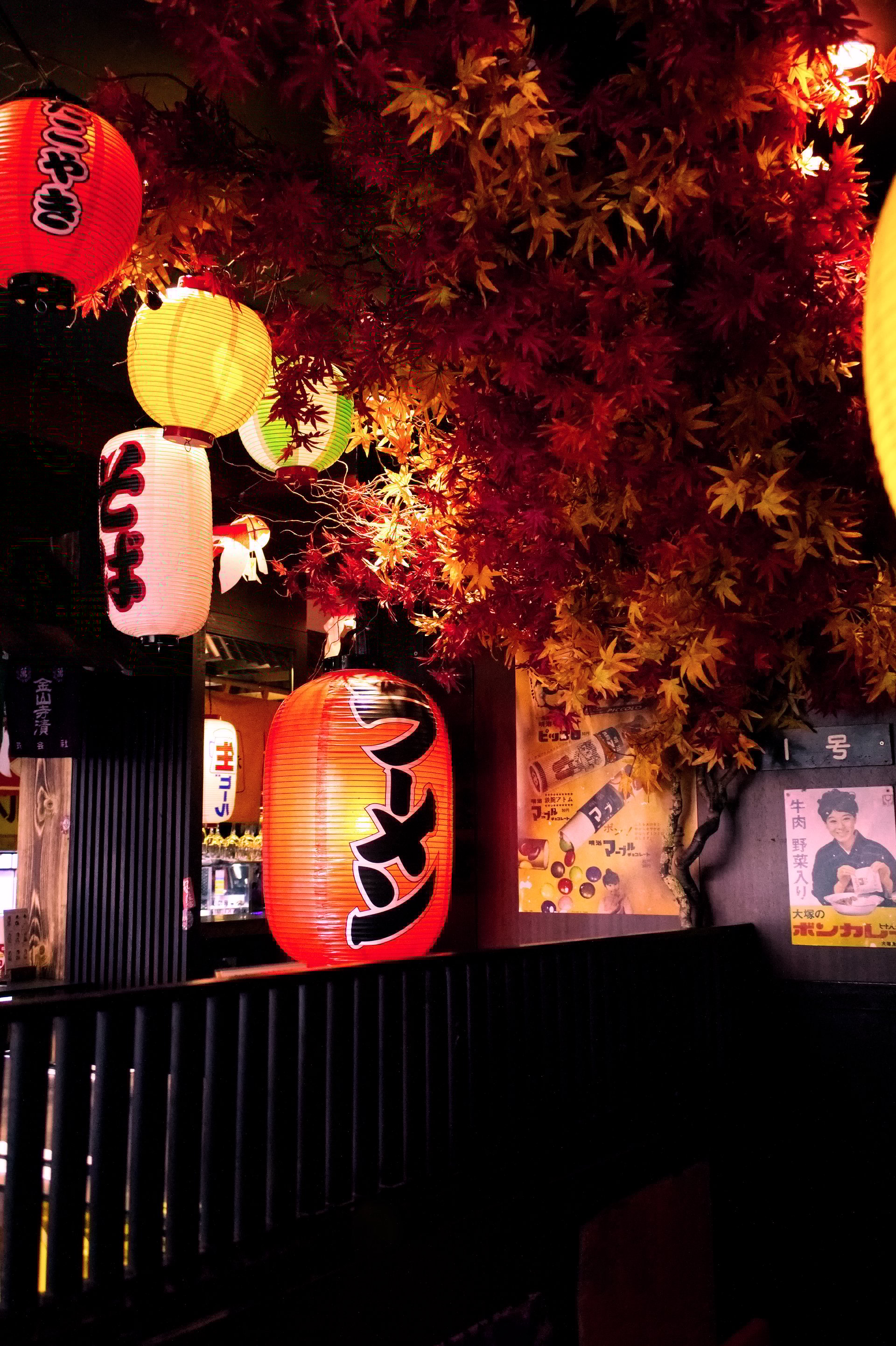 Central London, UK - May 31, 2023: Panton Street, Leister Square - Panton Yokocho, entrance of the Yokocho Ramen restaurant to show their beautiful illuminated oriental lanterns.