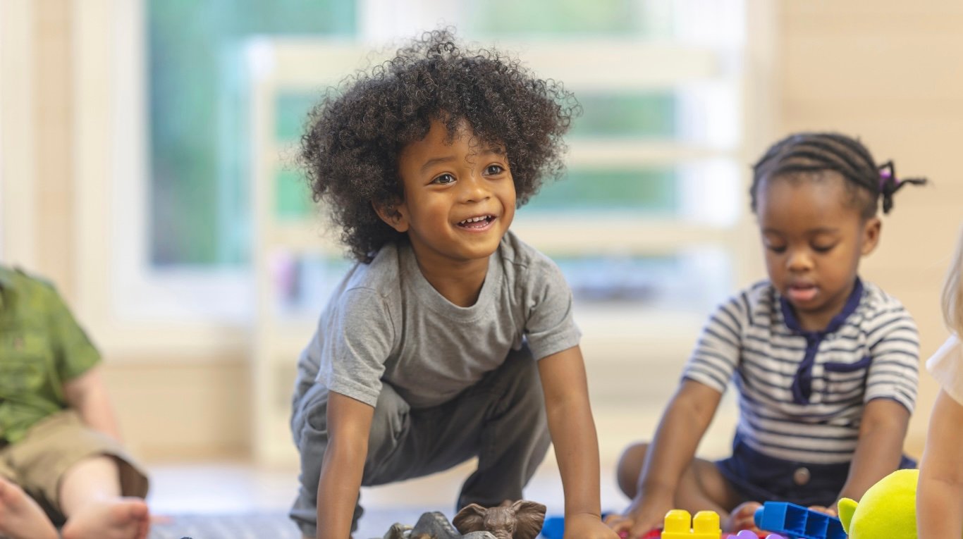 Preschool environment with children and educator