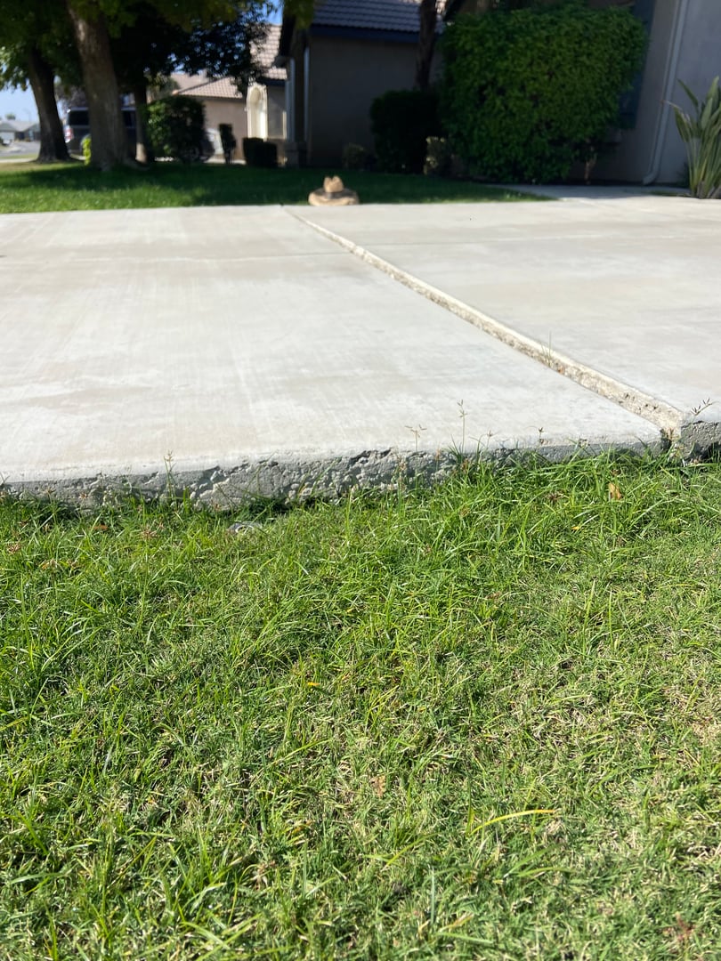 Residential driveway repair before in Bakersfield