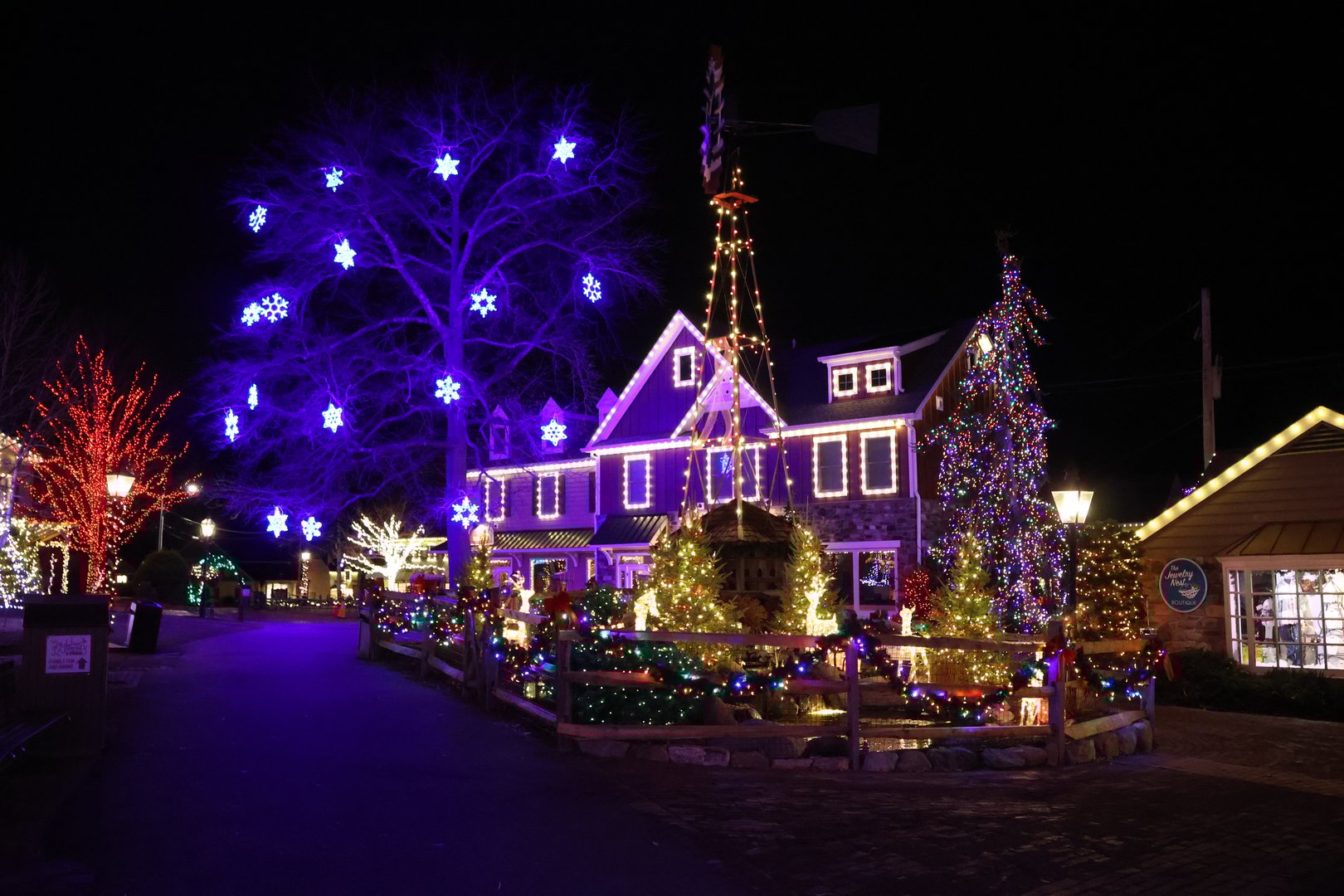 A night filled with bright Christmas lights in a cozy village.