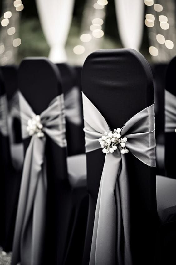 Elegant white chair covers at wedding ceremony