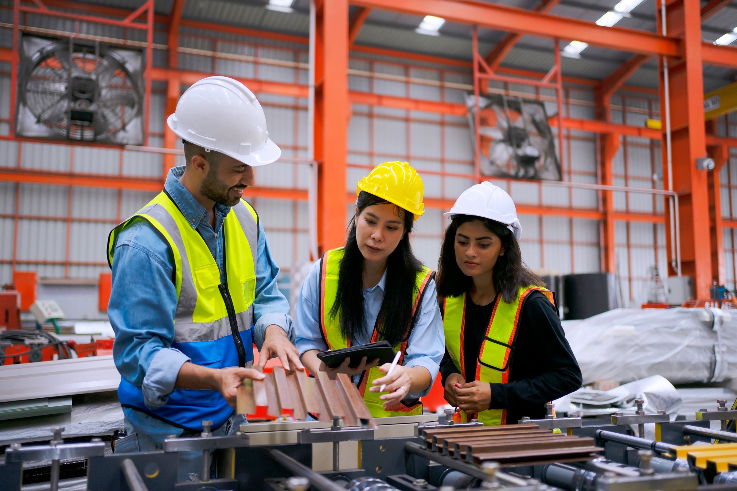 Blue collar worker work at metal sheet factory. Blue collar worker and industry concept.