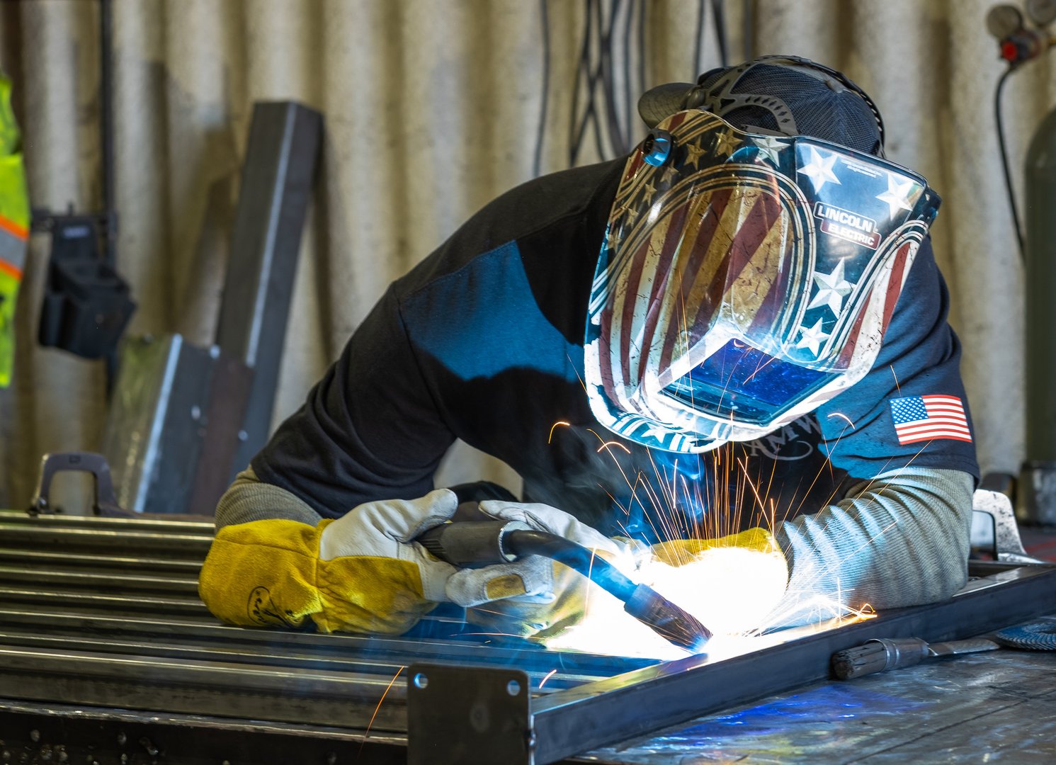 Metal fabrication workshop showing custom design process