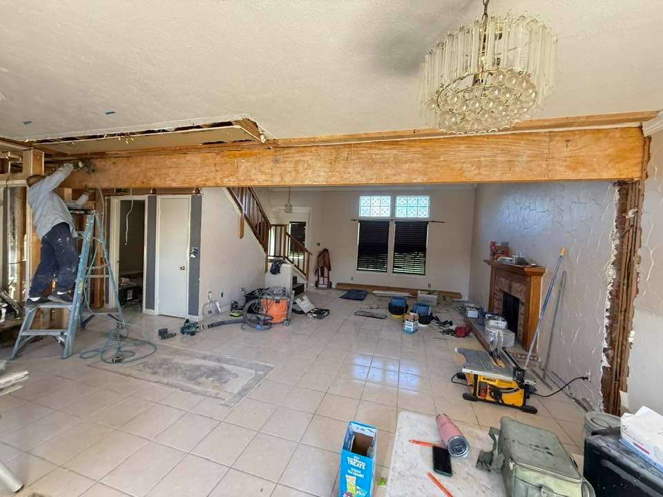 Kitchen remodeling in Toledo area – white cabinets with granite countertops and stainless steel appliances