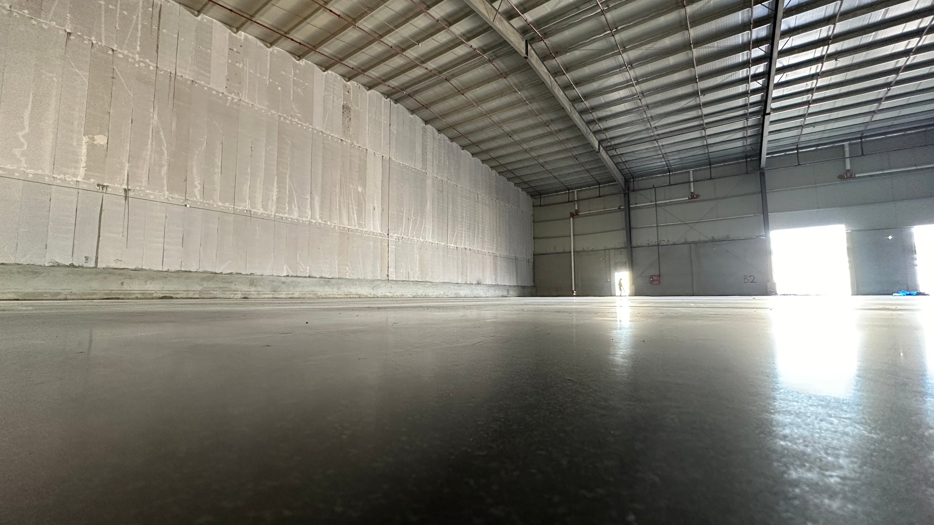 Industrial building or modern factory for manufacturing production plant or large warehouse, Polished concrete floor clean condition and space for industry product display or industry background.