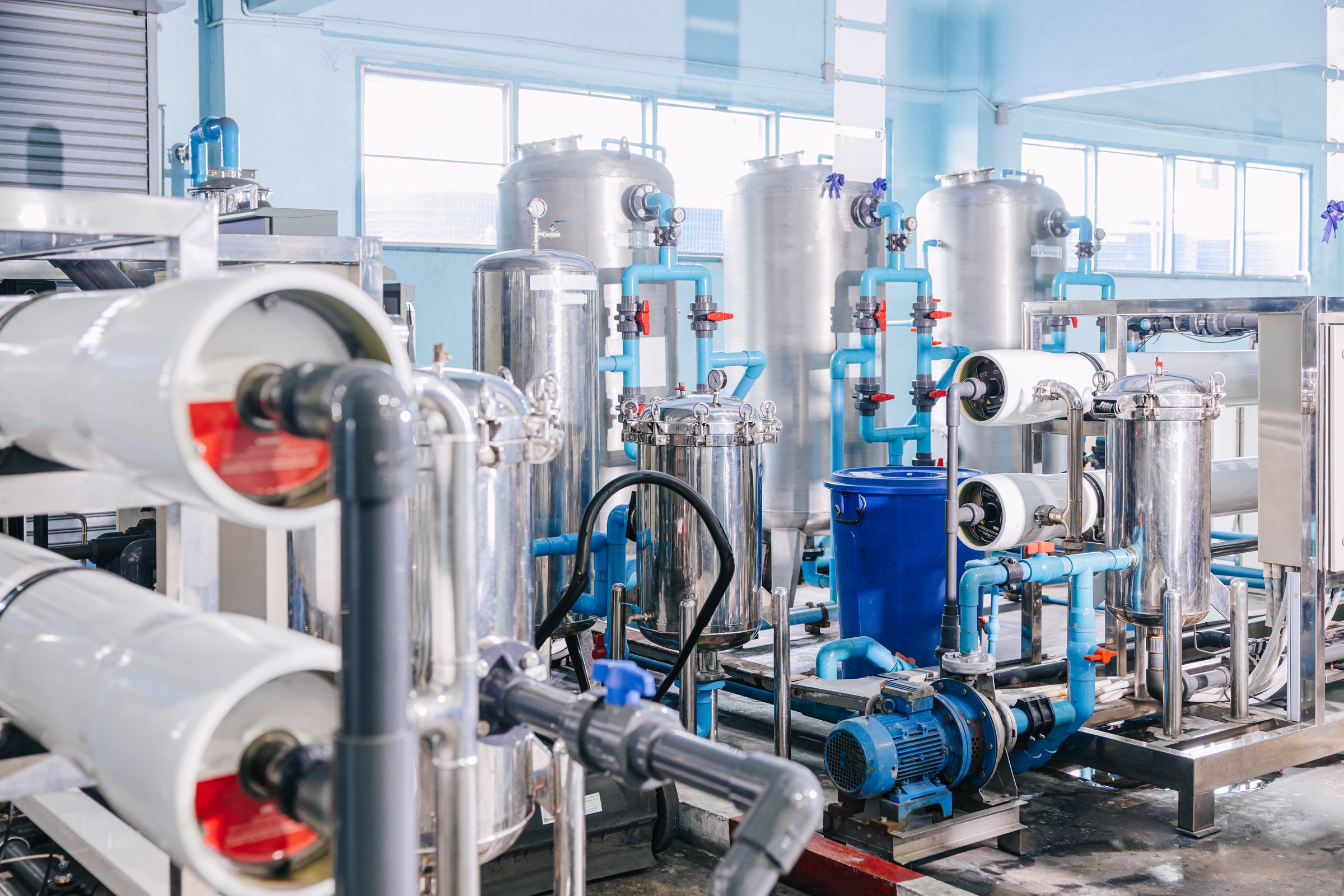 Water purity filtering system in drinking water plant, Food and drink factory clean water purification area.