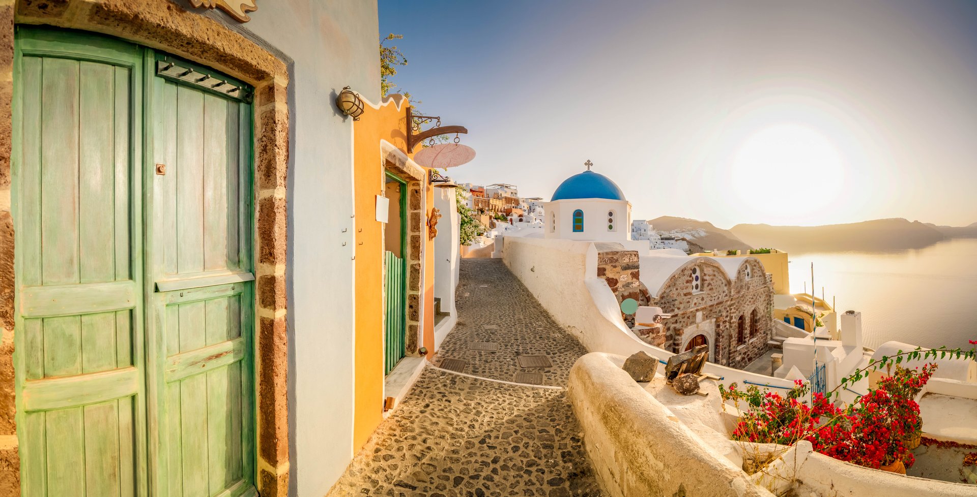 typical street of Oia, traditional greek village of Santorini, Greece, panorama