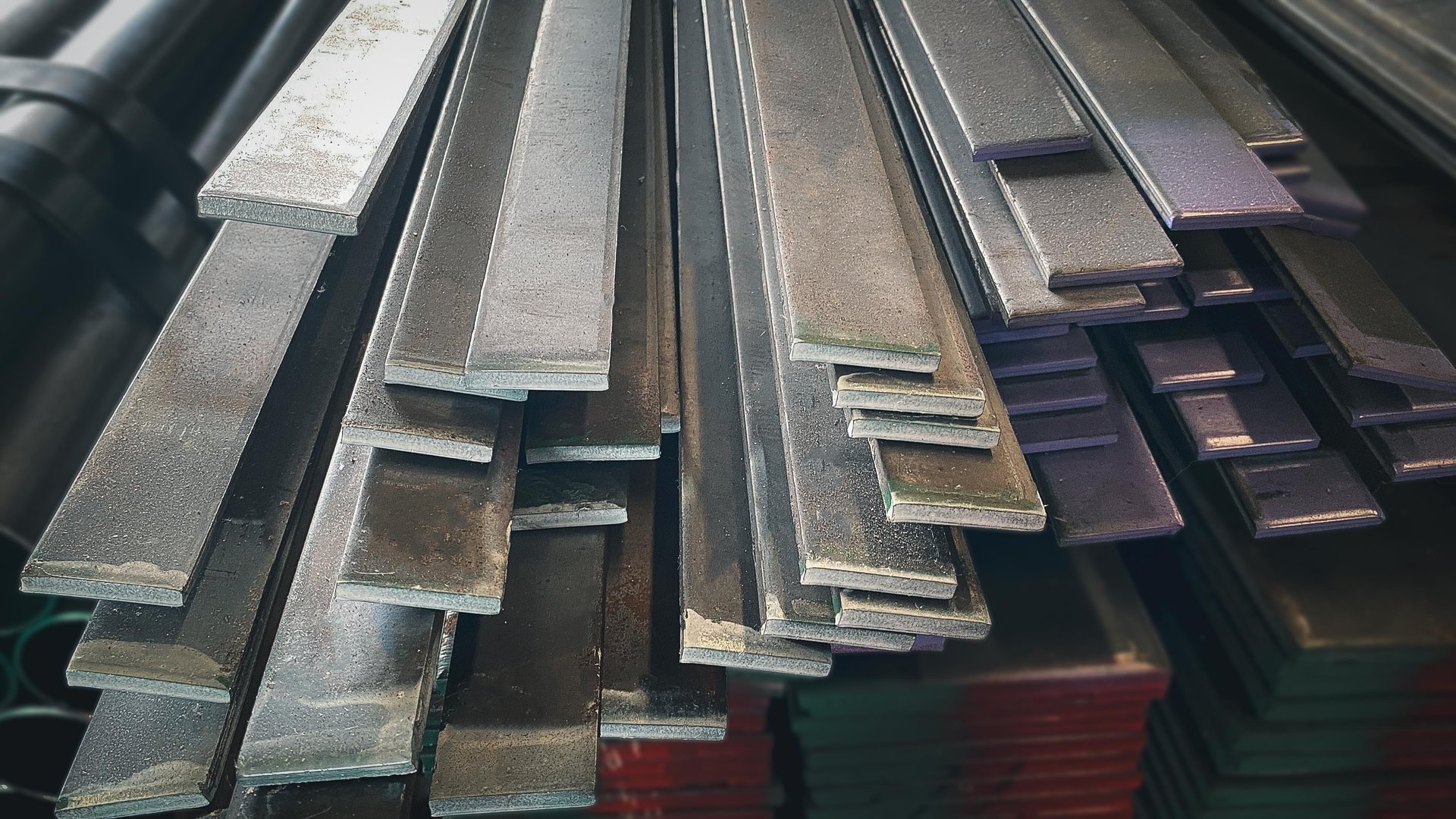 Stack of stainless steel flat bar of background. metallurgy industry,Background with stacked stainless steel flat bar.