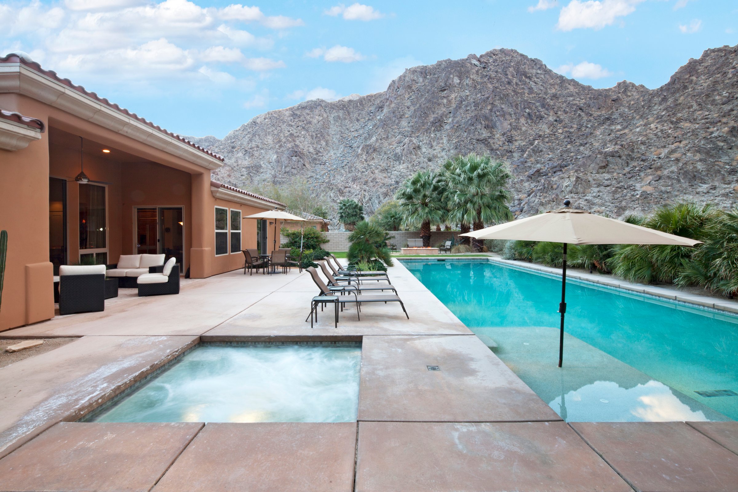 Rear view of luxury villa with swimming pool