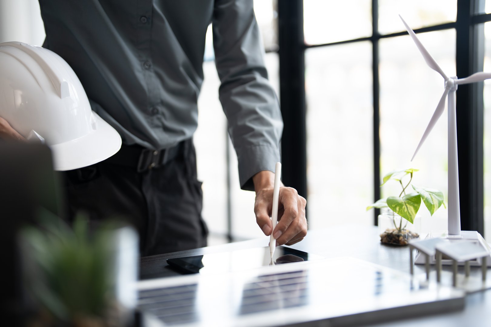 Engineer planning for Solar panels green energy Business man working Innovation  green eco friendly in modern office business  Planing Bio economy for business renewable energy eco friendly Engineer.