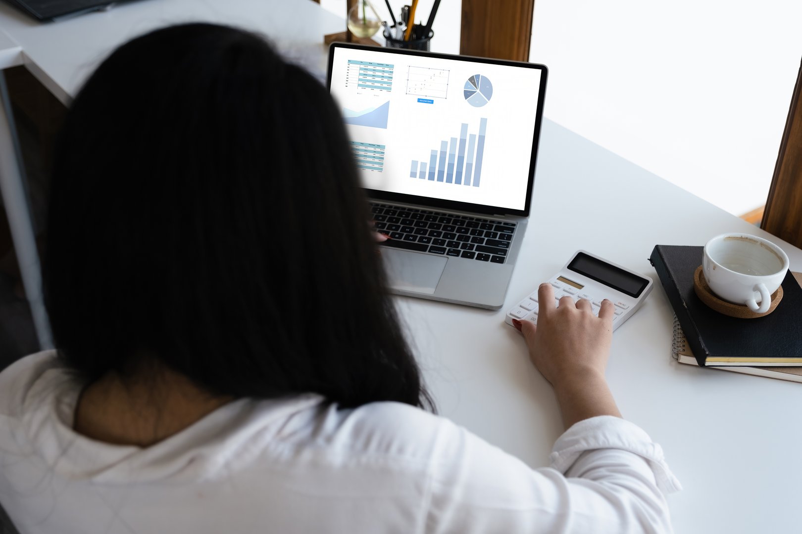 data analysis, budget calculation, research, risk management, portrait of Asian women using computers and financial documents in capital planning to increase company profits.