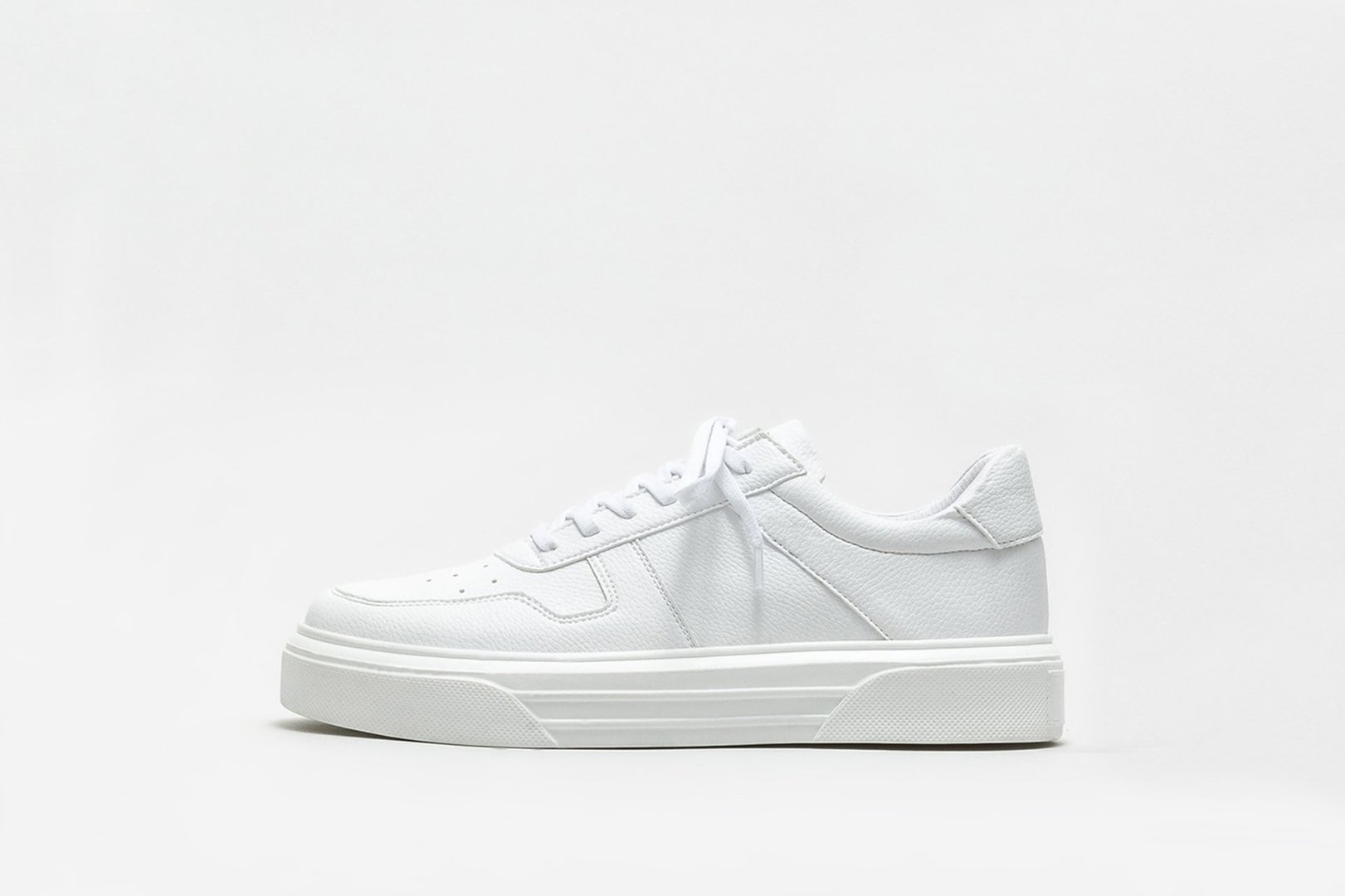 White leather sneaker on a white background