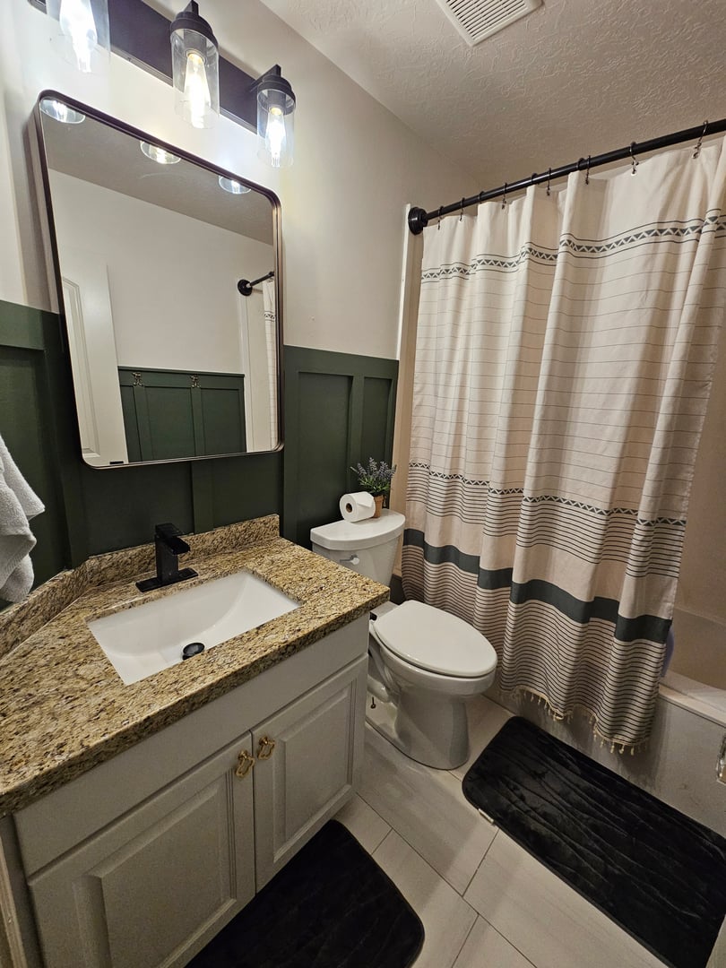 Cozy guest bathroom with decorative accents and welcoming touches