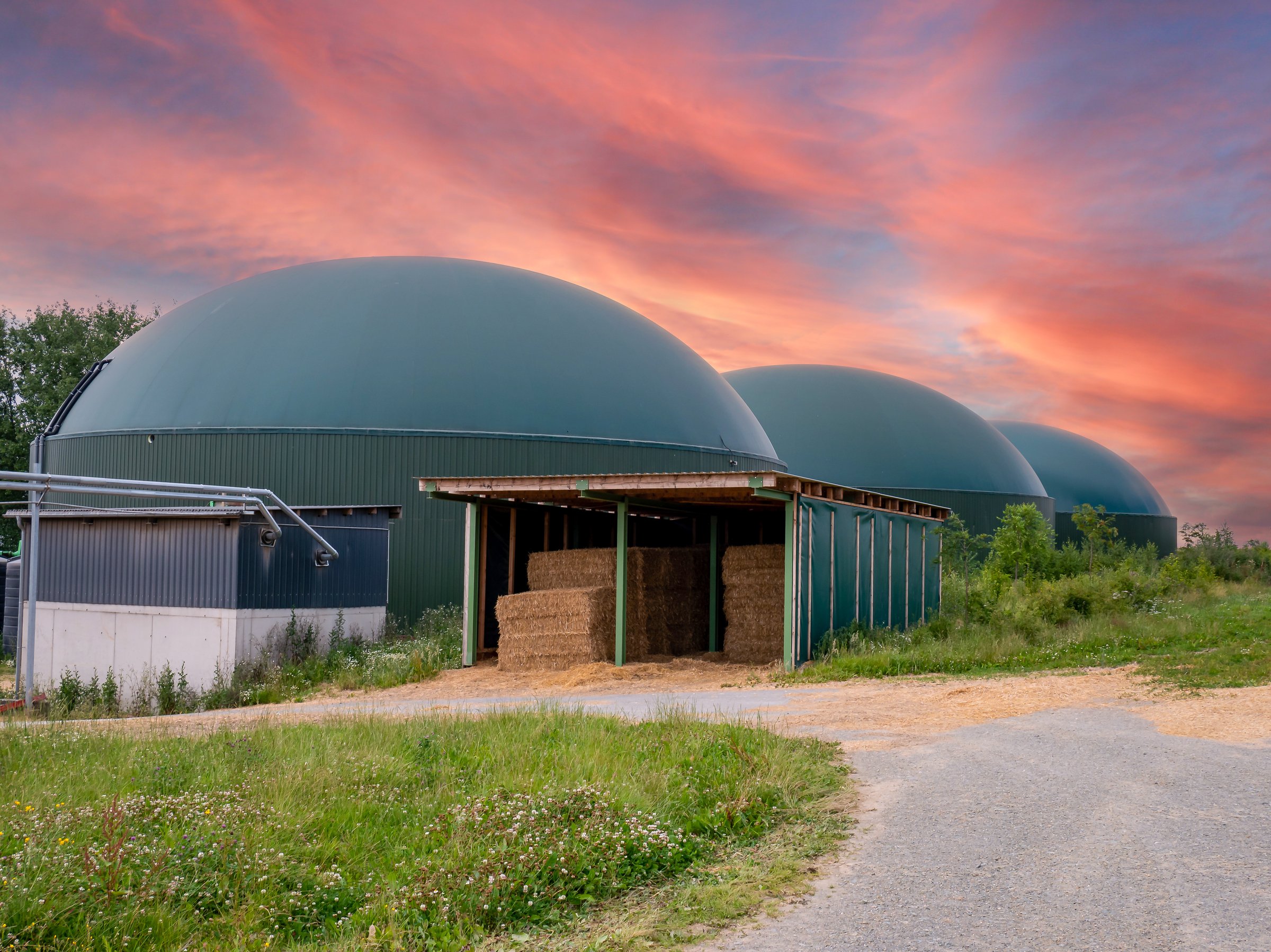 biogas production, biogas plant, bio power with sunset