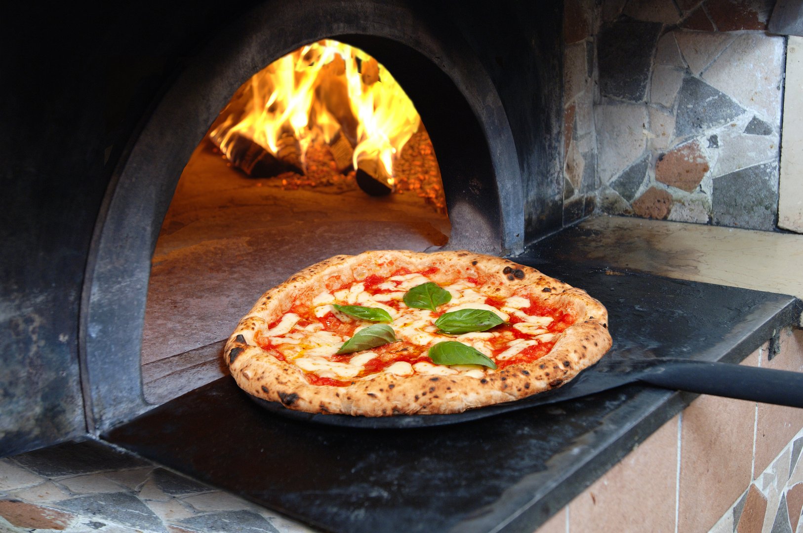 pizza margherita in Italy Naples just out of the wood oven