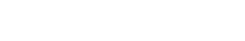 A minimalist image with a solid white background. No distinct objects or features visible.