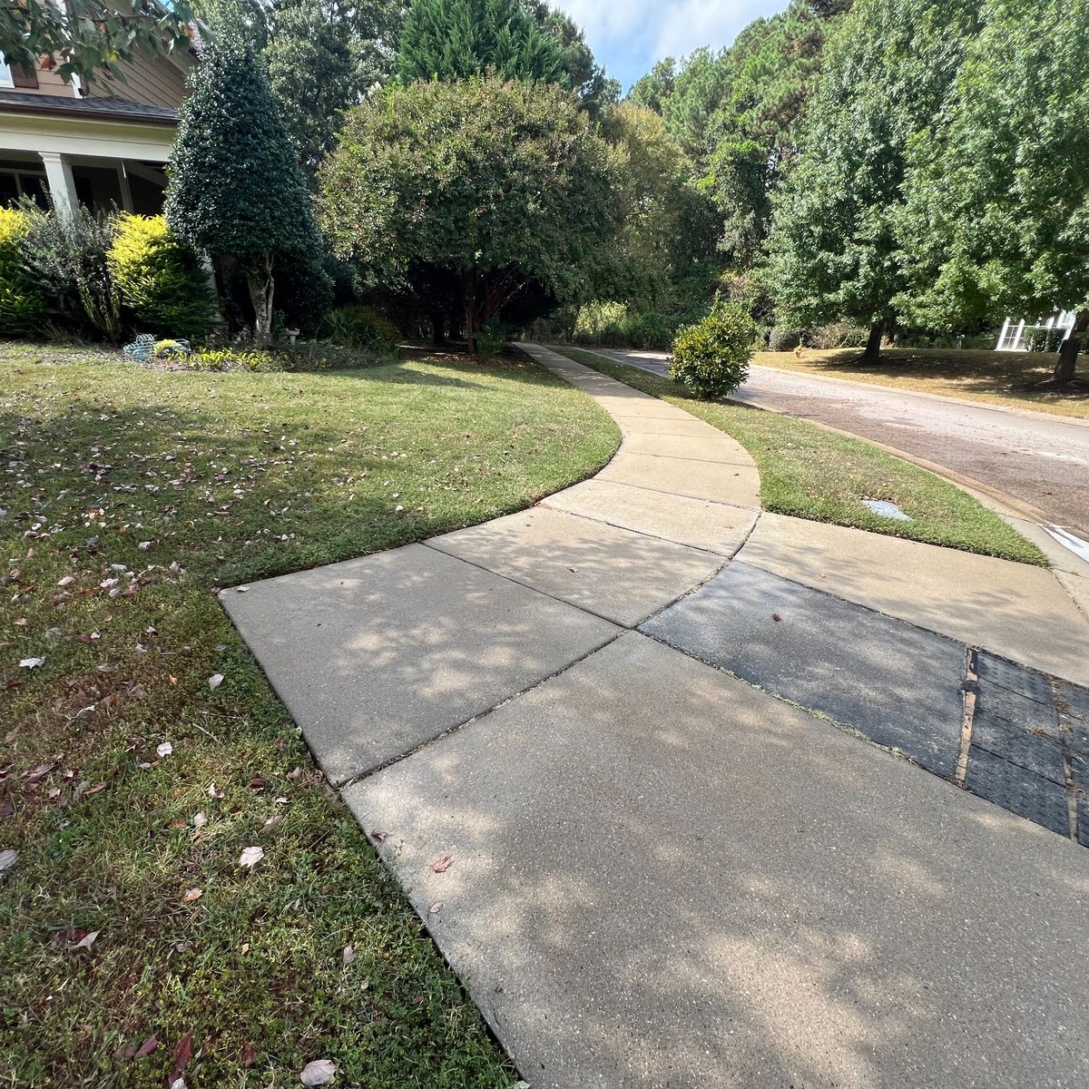 Before sidewalk cleaning in Wake Forest NC - dirty curved sidewalk
