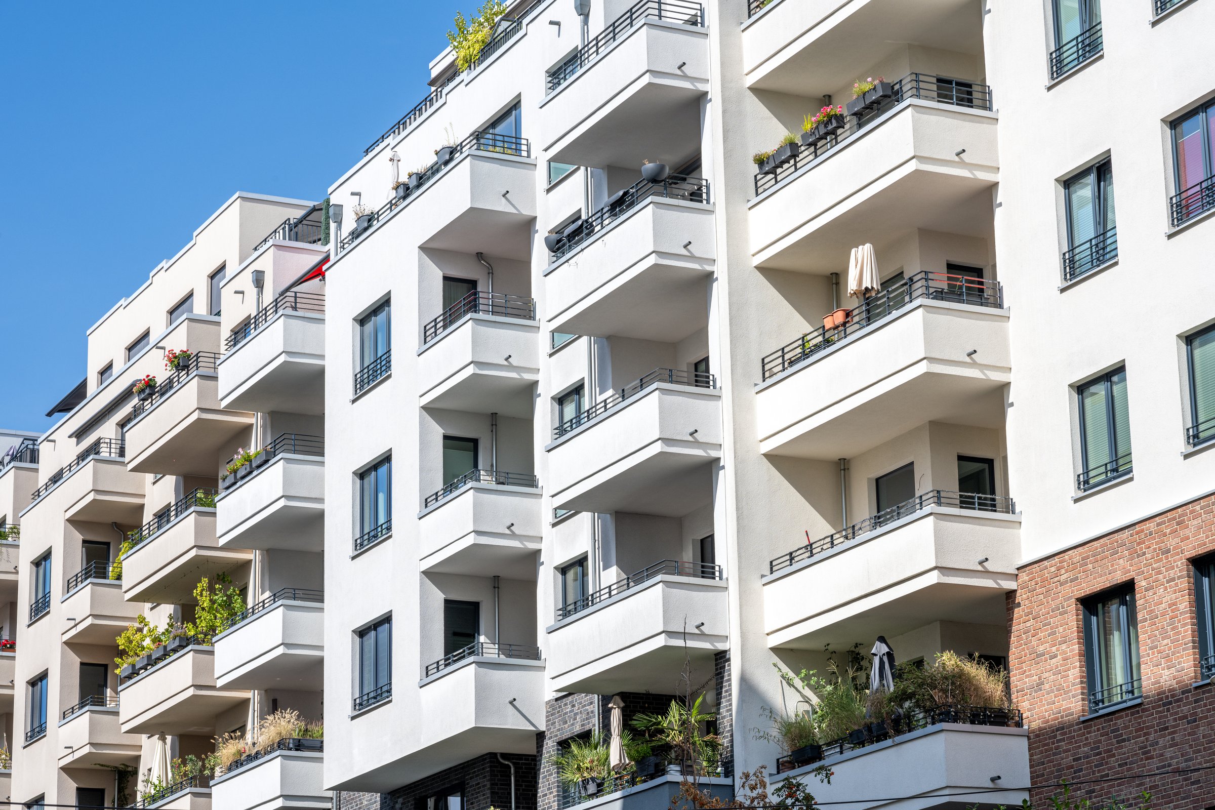 White multi-family residential building, seen in Berlin, Germany