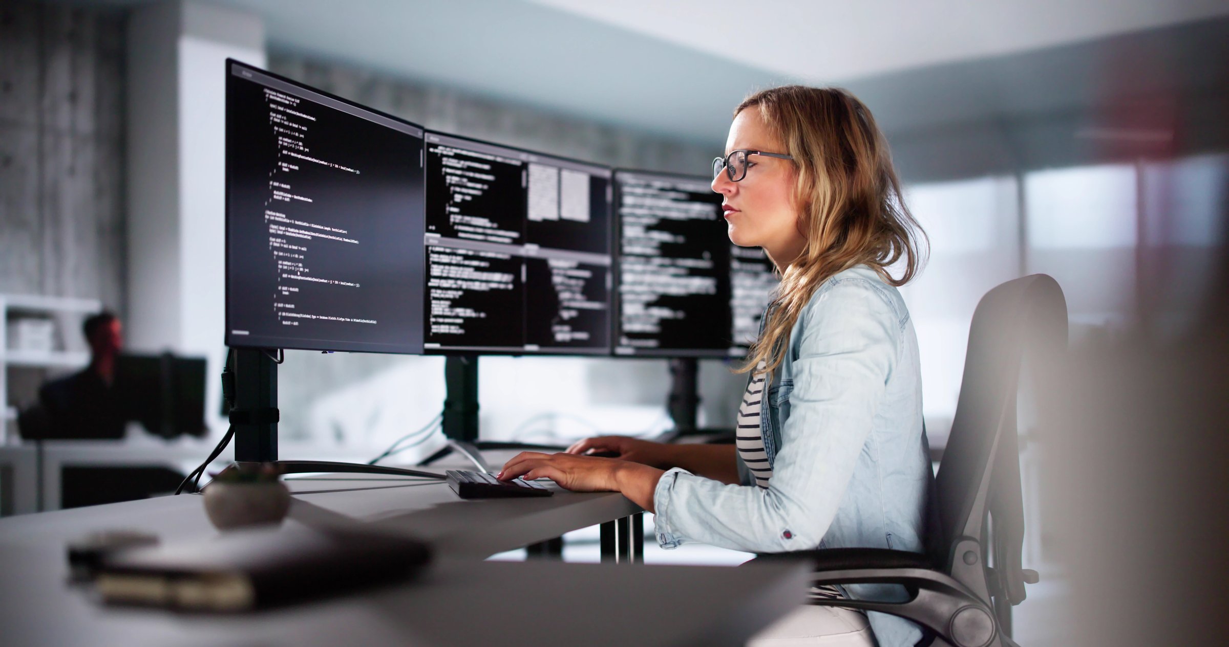 Software Programmer Or Coder Woman Using Office Computer