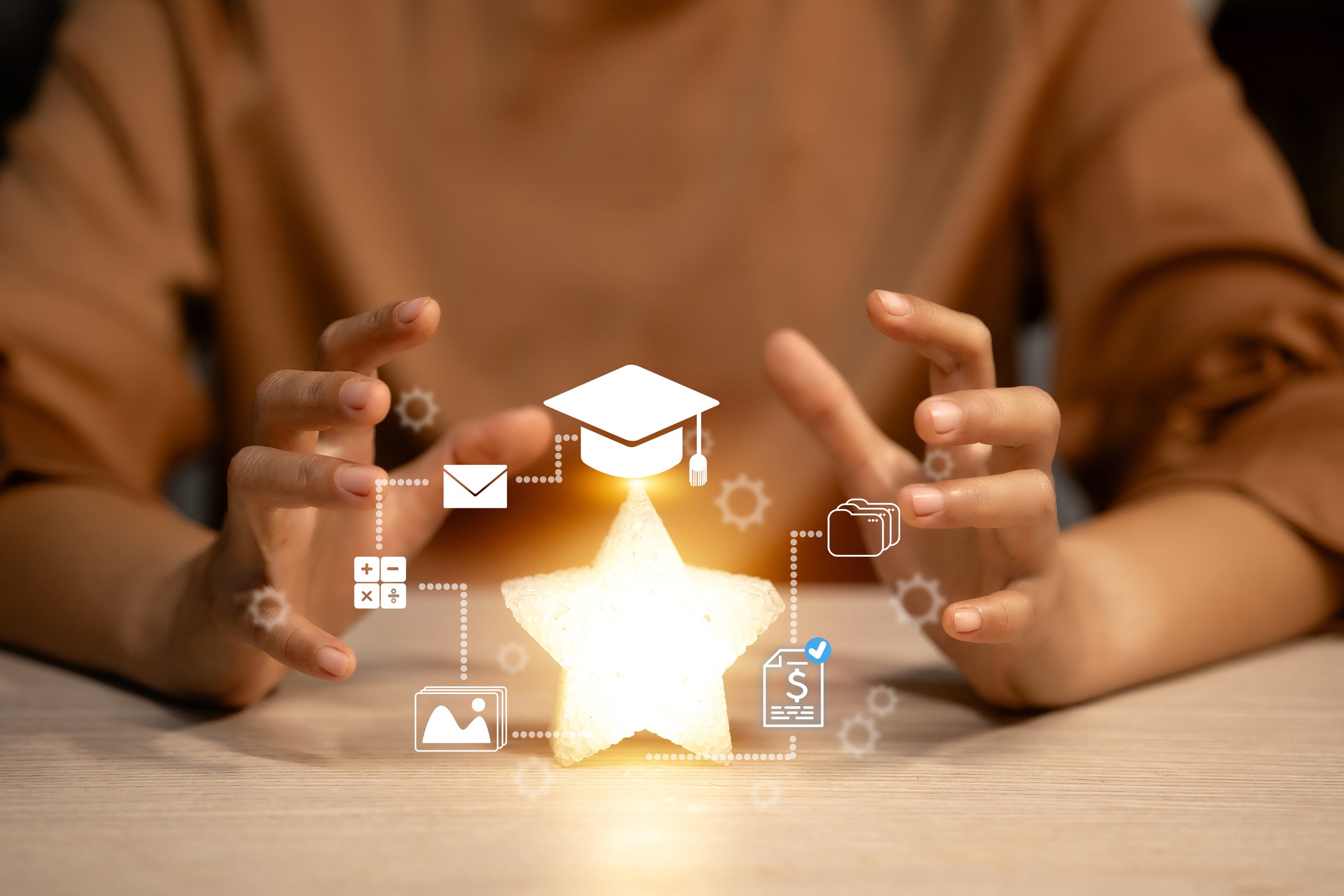 Hands framing a glowing star surrounded by educational and financial icons, showcasing a focus on learning and financial management.